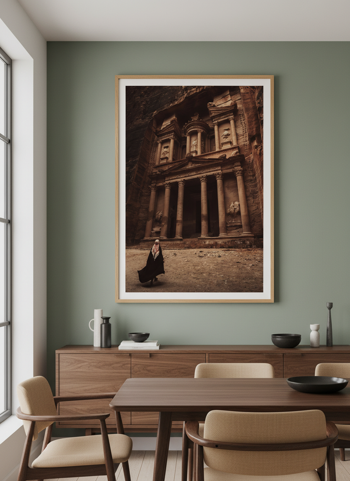 Wall art styled above a dining table in a contemporary home