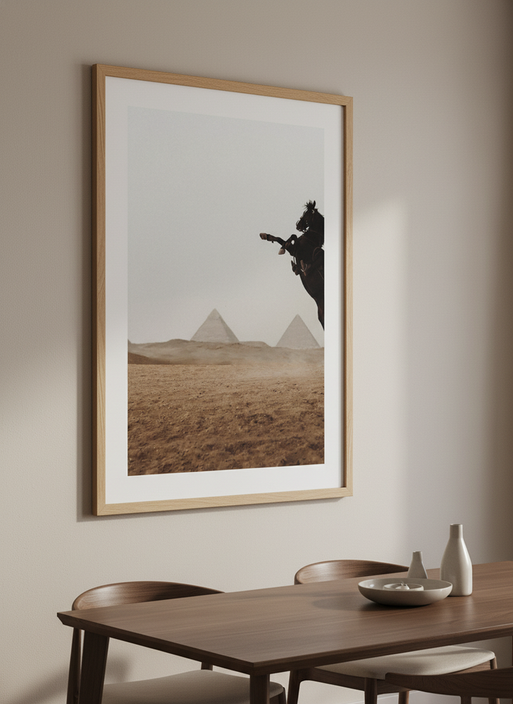 Wall art styled above a dining table in a contemporary home