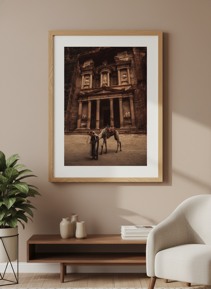 Modern wall art styled above a sofa in a neutral living room