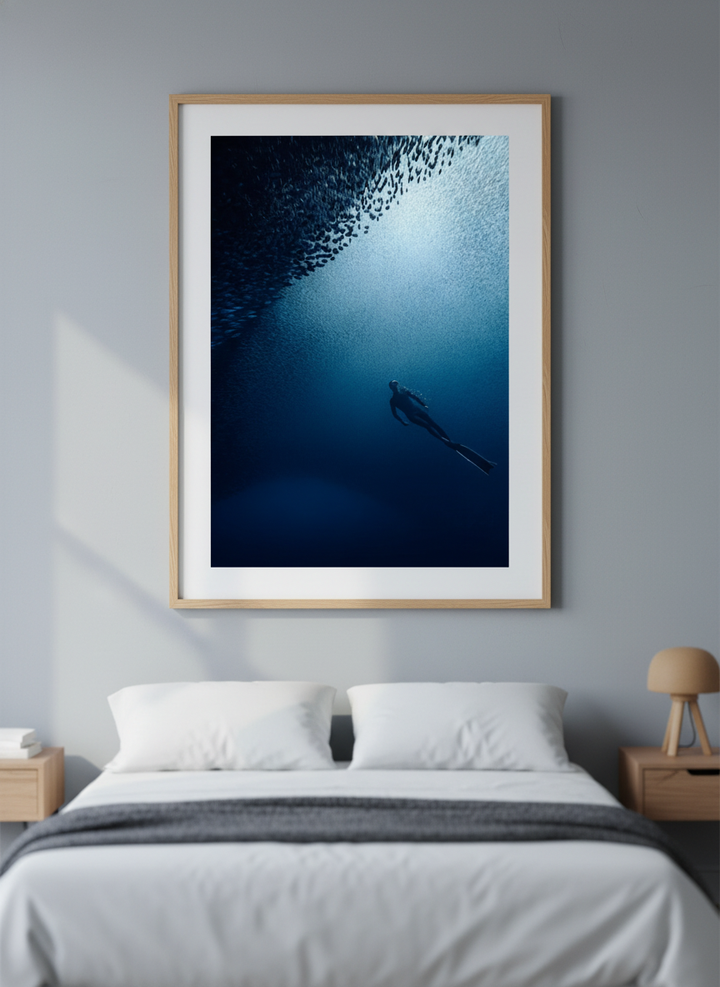 Minimalist artwork displayed in a calm, light-filled bedroom interior