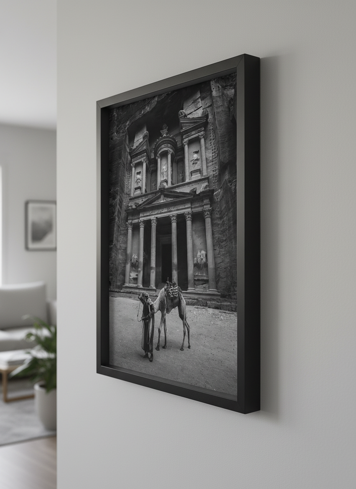 Modern wall art styled above a sofa in a neutral living room