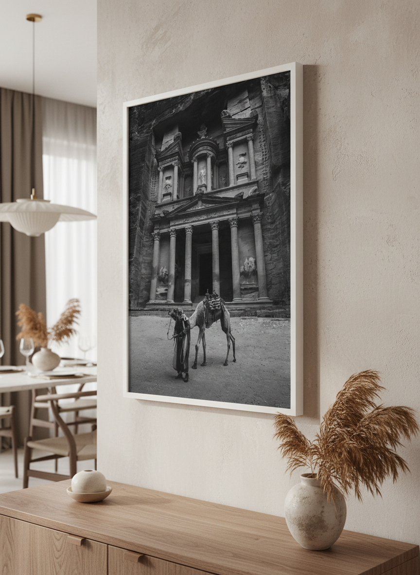 Wall art styled above a dining table in a contemporary home