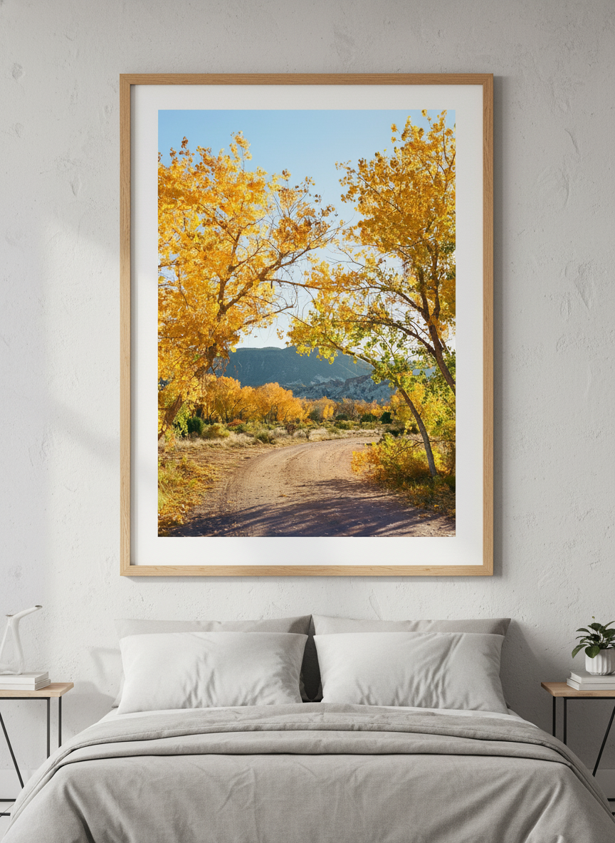 Minimalist artwork displayed in a calm, light-filled bedroom interior