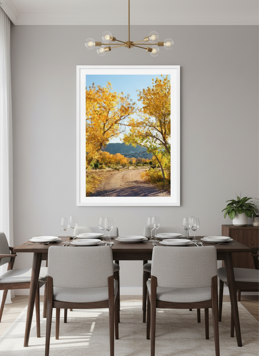 Wall art styled above a dining table in a contemporary home