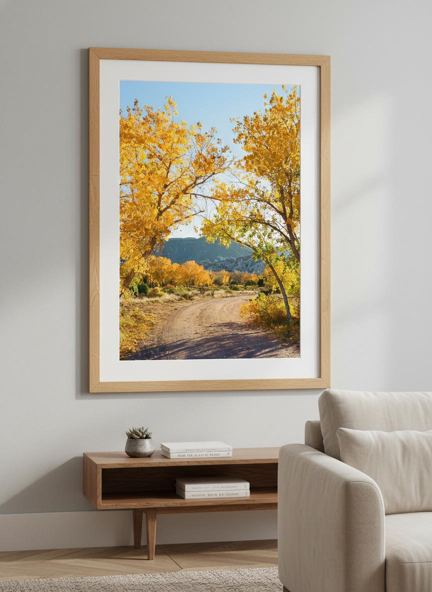 Modern wall art styled above a sofa in a neutral living room