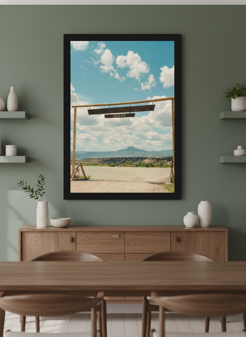 Wall art styled above a dining table in a contemporary home
