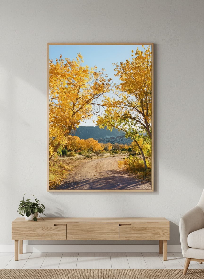 Modern wall art styled above a sofa in a neutral living room
