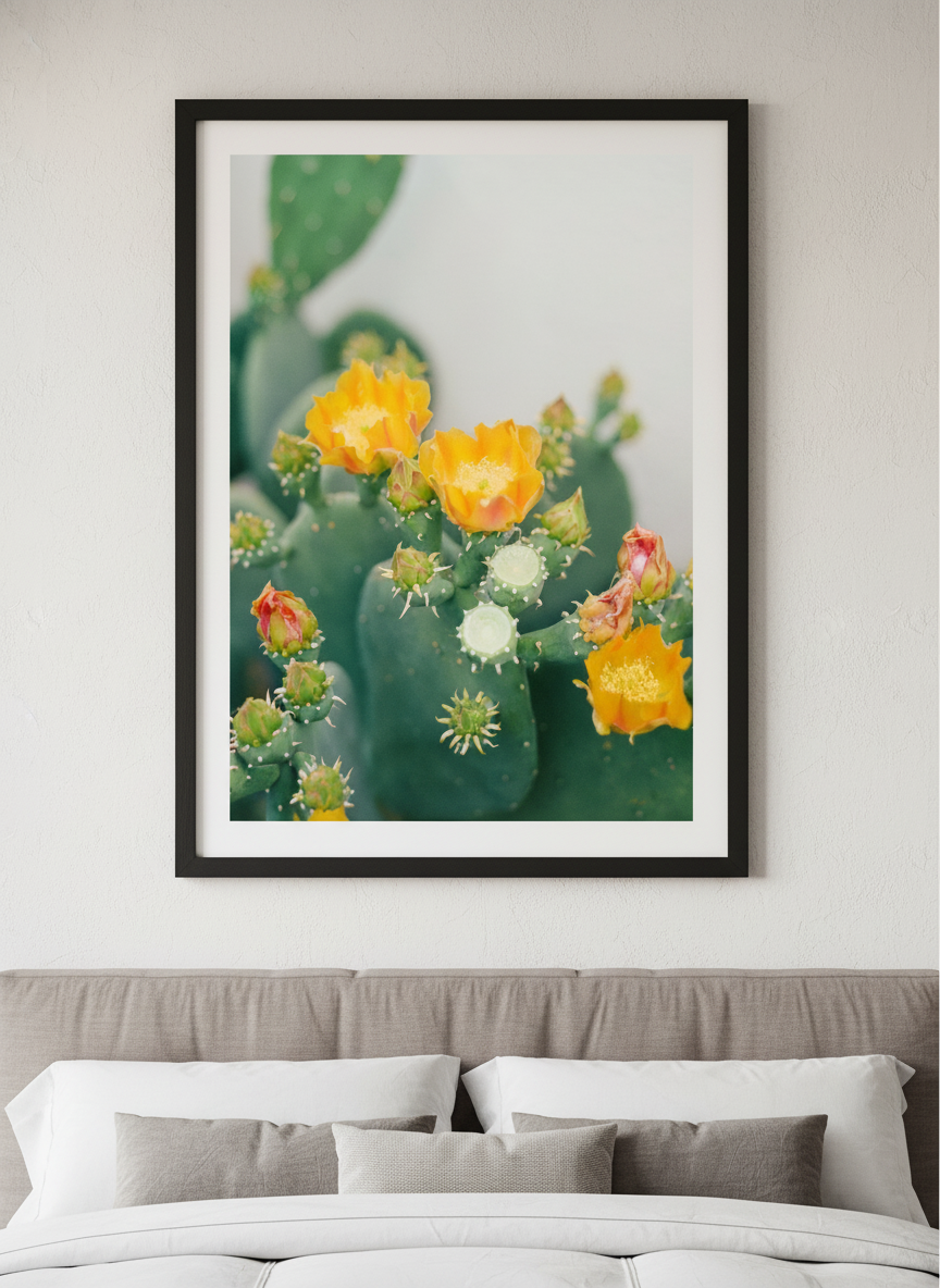 Minimalist artwork displayed in a calm, light-filled bedroom interior