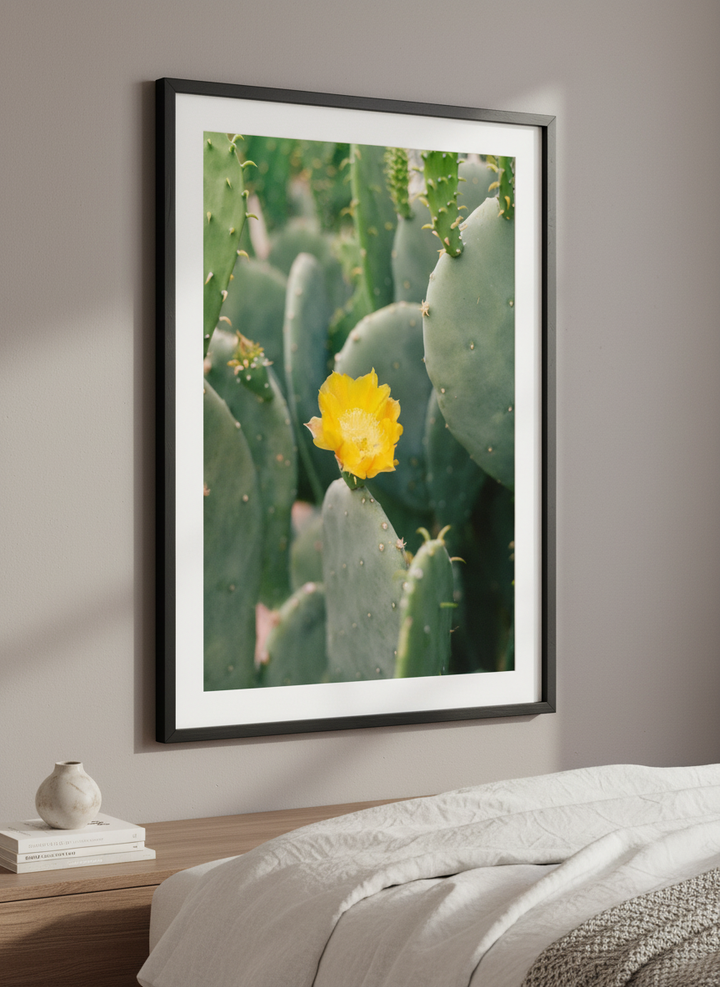Minimalist artwork displayed in a calm, light-filled bedroom interior
