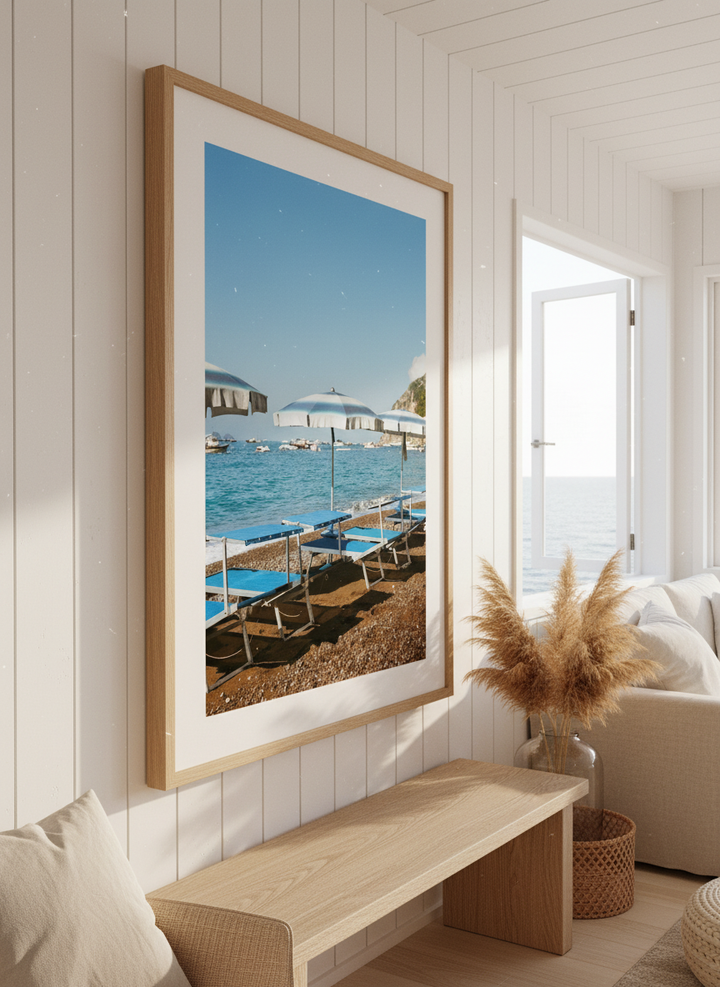 Neutral wall art displayed in a sunny coastal beach house