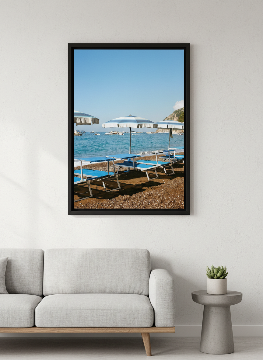 Modern wall art styled above a sofa in a neutral living room
