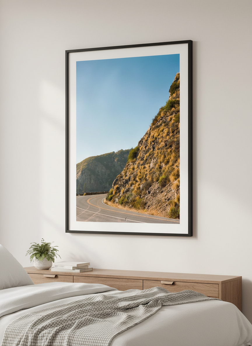 Minimalist artwork displayed in a calm, light-filled bedroom interior