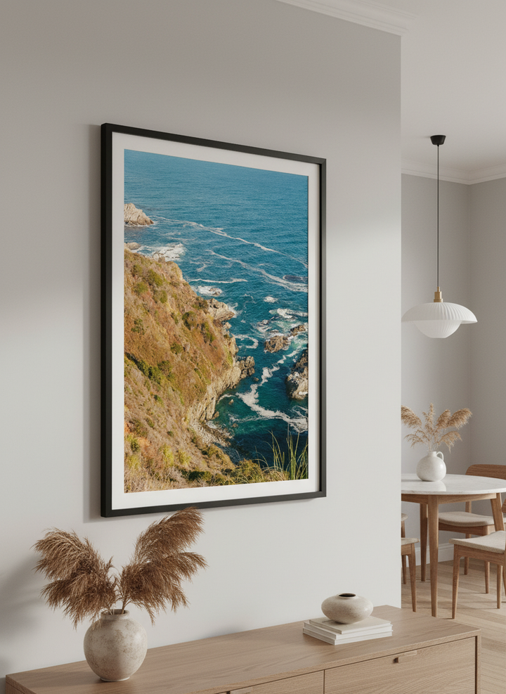 Wall art styled above a dining table in a contemporary home