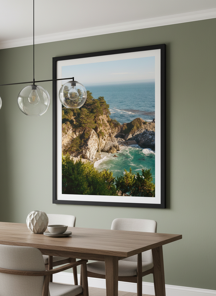Wall art styled above a dining table in a contemporary home