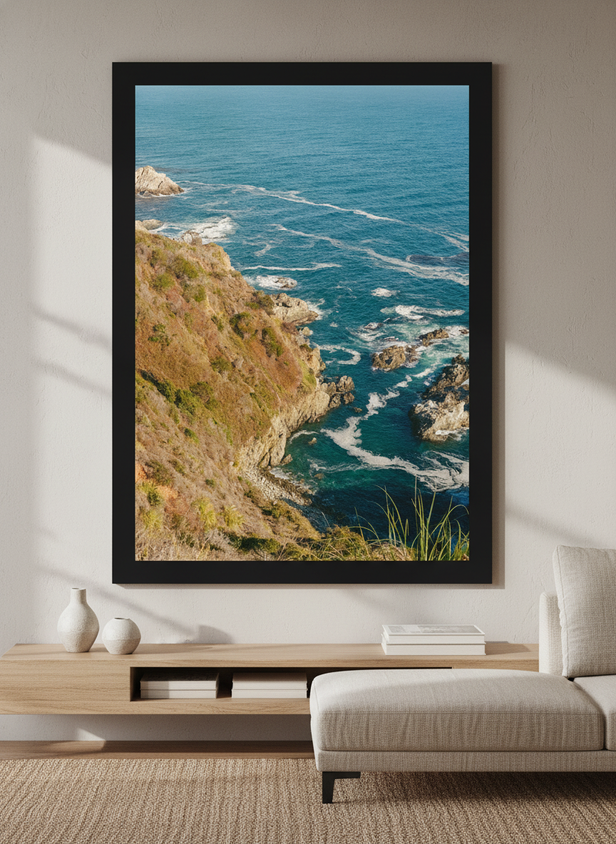 Modern wall art styled above a sofa in a neutral living room