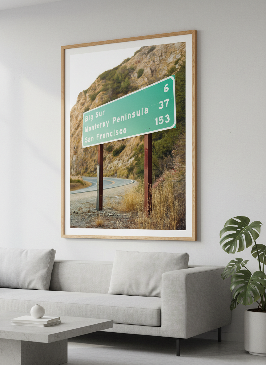 Modern wall art styled above a sofa in a neutral living room