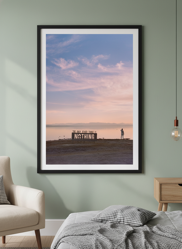 Minimalist artwork displayed in a calm, light-filled bedroom interior