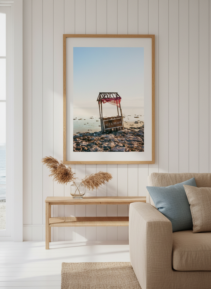 Neutral wall art displayed in a sunny coastal beach house