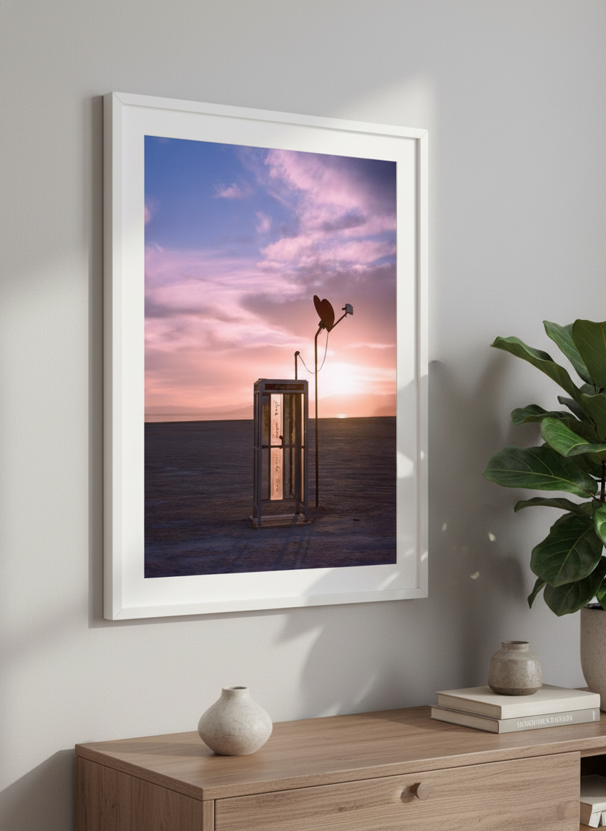 Modern wall art styled above a sofa in a neutral living room