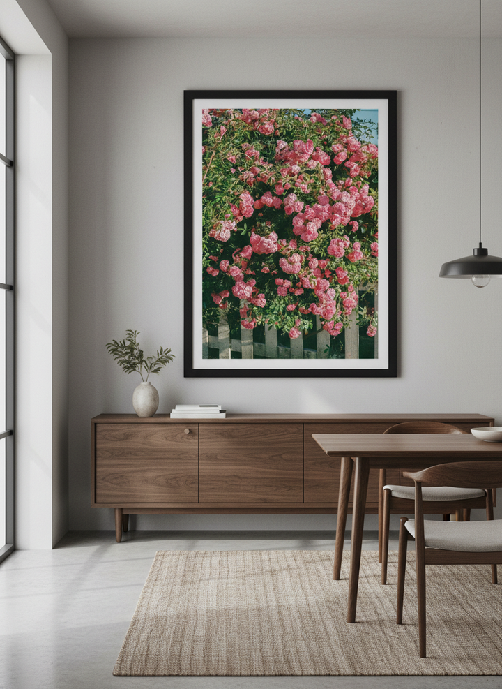 Wall art styled above a dining table in a contemporary home