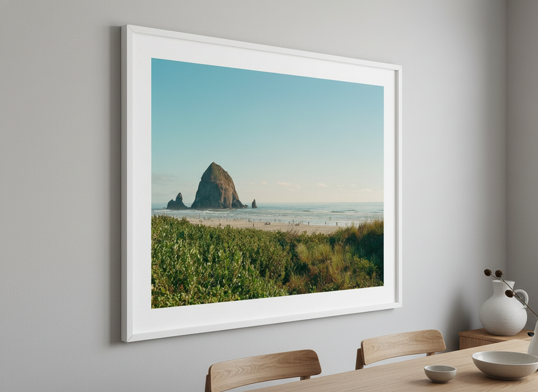 Wall art styled above a dining table in a contemporary home