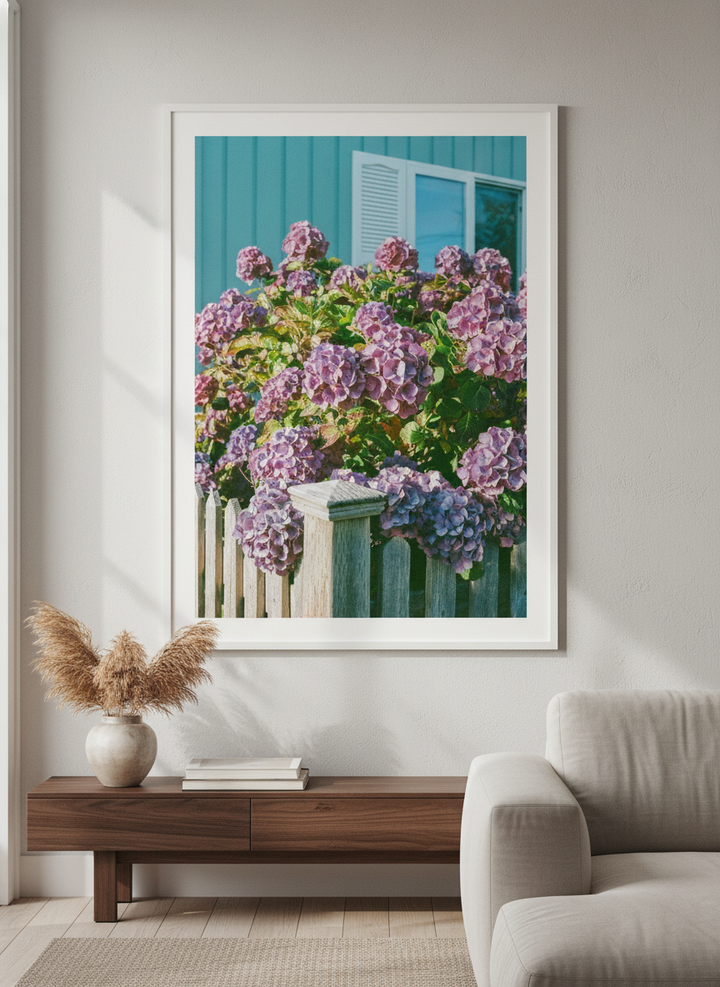 Modern wall art styled above a sofa in a neutral living room
