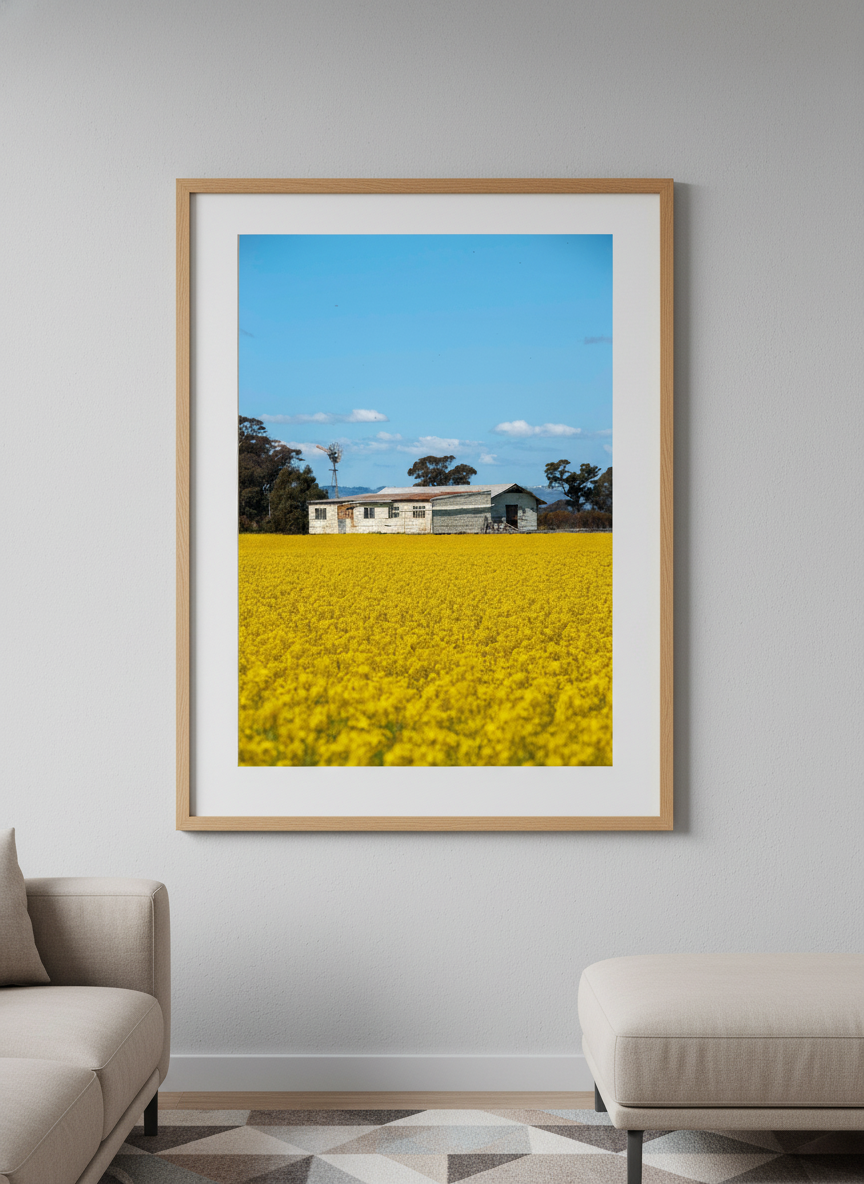 Modern wall art styled above a sofa in a neutral living room