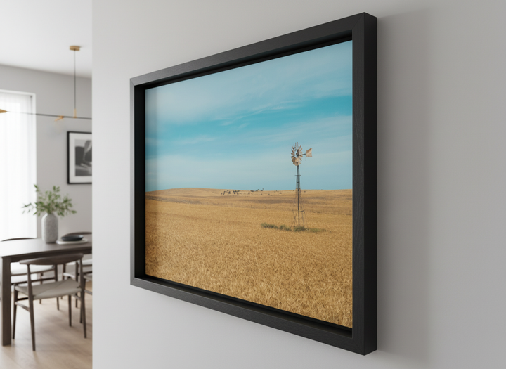 Wall art styled above a dining table in a contemporary home