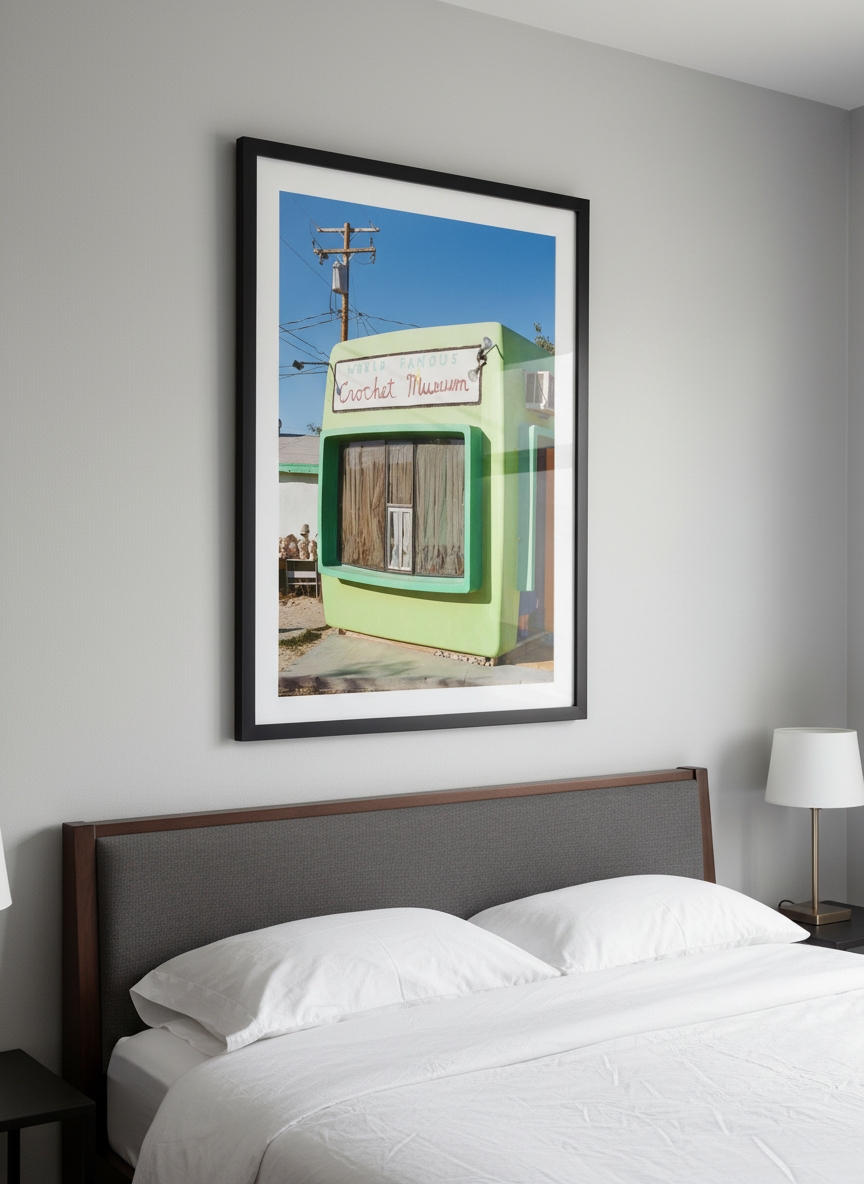 Minimalist artwork displayed in a calm, light-filled bedroom interior