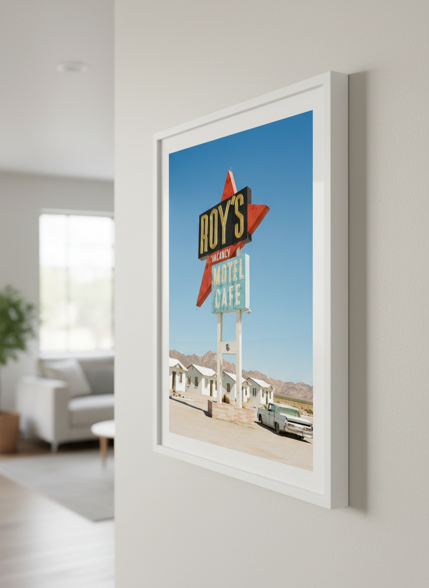 Modern wall art styled above a sofa in a neutral living room