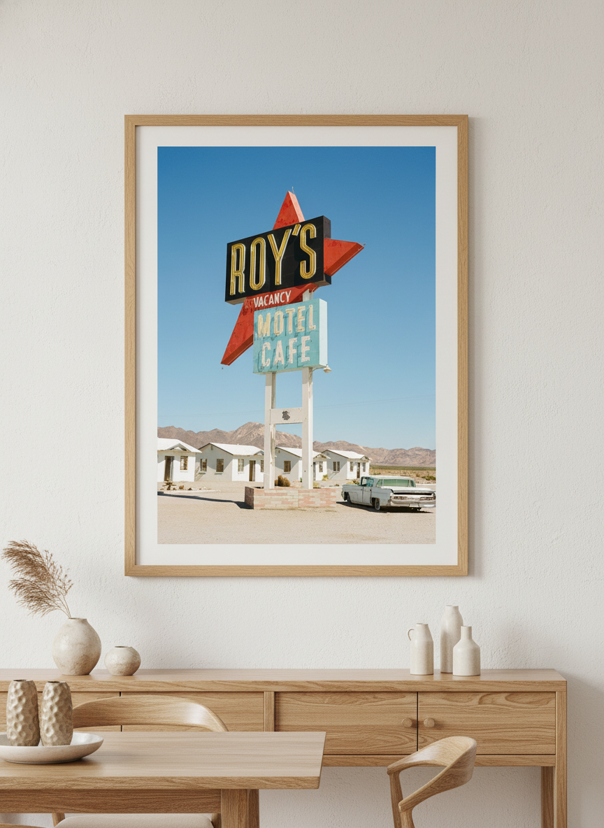 Wall art styled above a dining table in a contemporary home