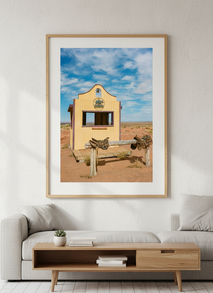 Modern wall art styled above a sofa in a neutral living room