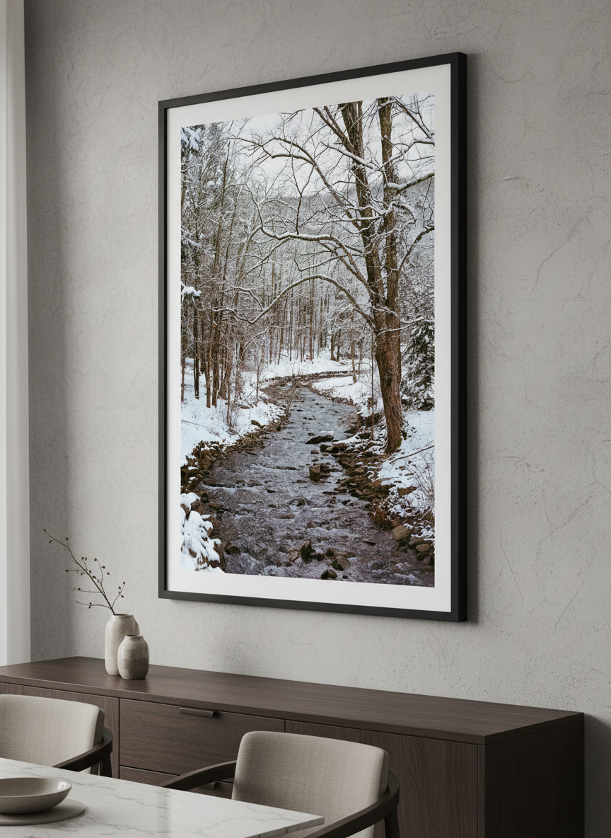 Wall art styled above a dining table in a contemporary home