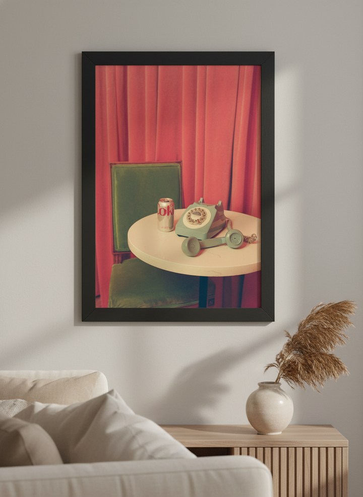 Modern wall art styled above a sofa in a neutral living room