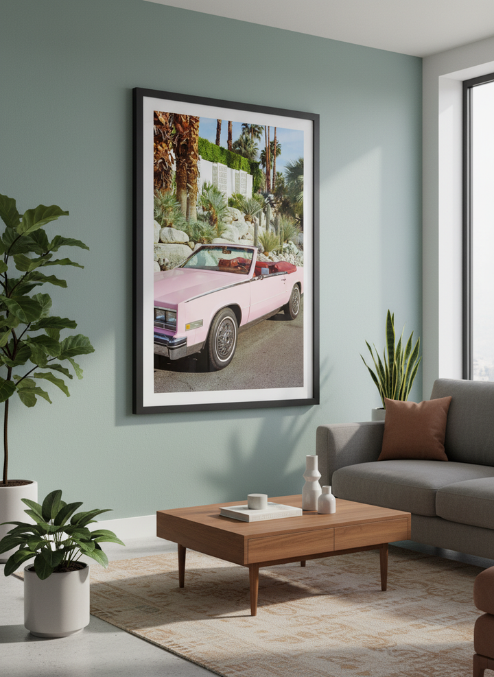 Modern wall art styled above a sofa in a neutral living room