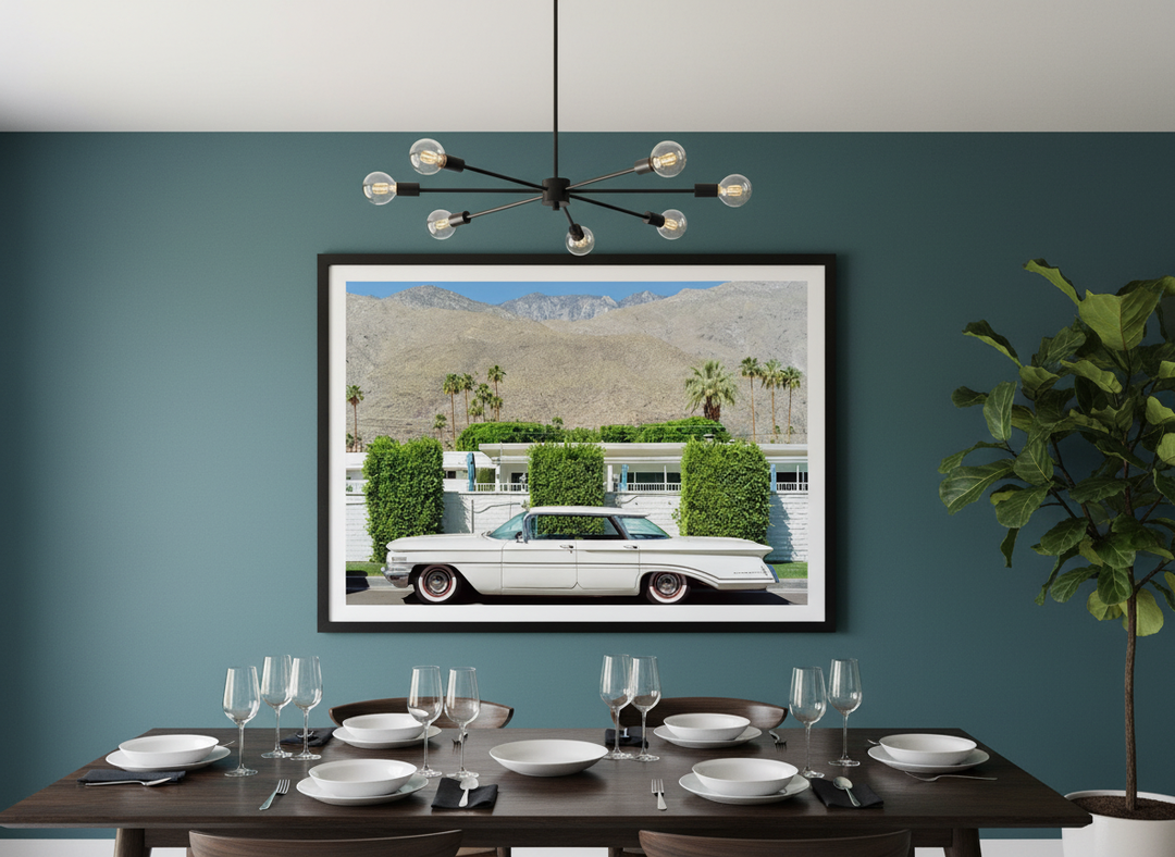 Wall art styled above a dining table in a contemporary home