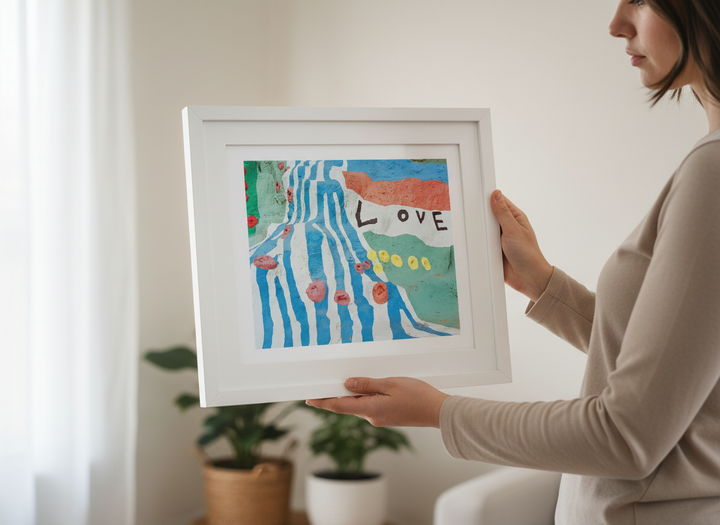 Person showcasing the artwork against a clean modern interior wall