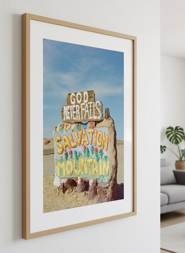 Modern wall art styled above a sofa in a neutral living room