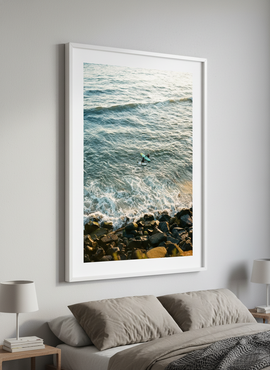 Minimalist artwork displayed in a calm, light-filled bedroom interior