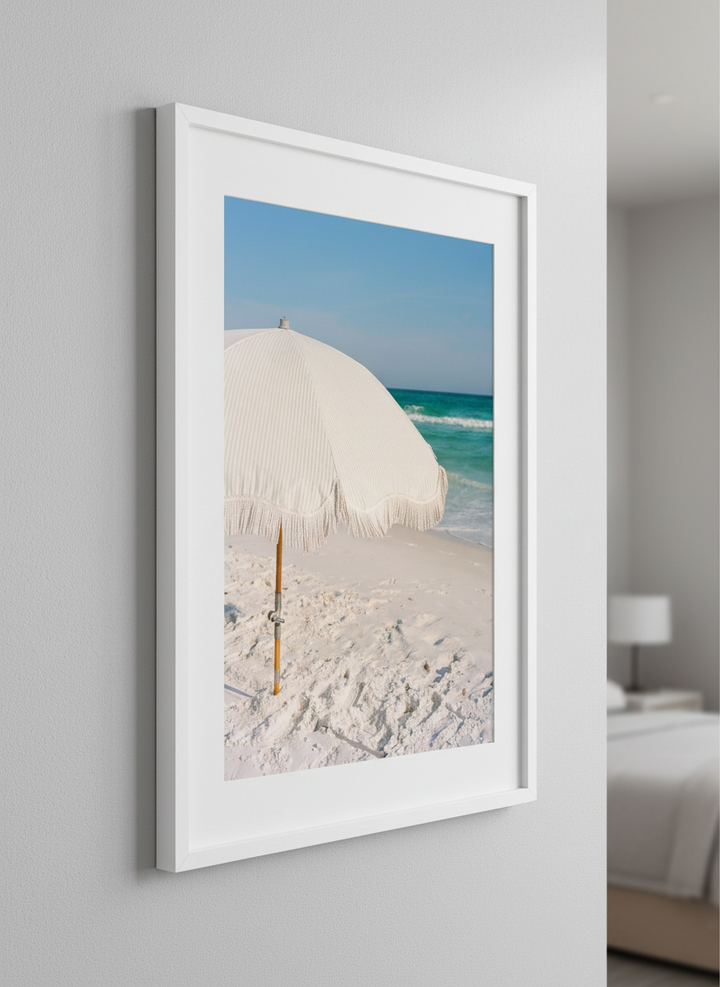 Minimalist artwork displayed in a calm, light-filled bedroom interior