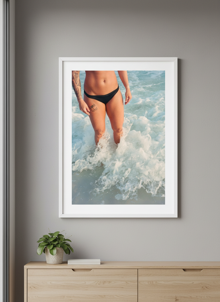 Minimalist artwork displayed in a calm, light-filled bedroom interior