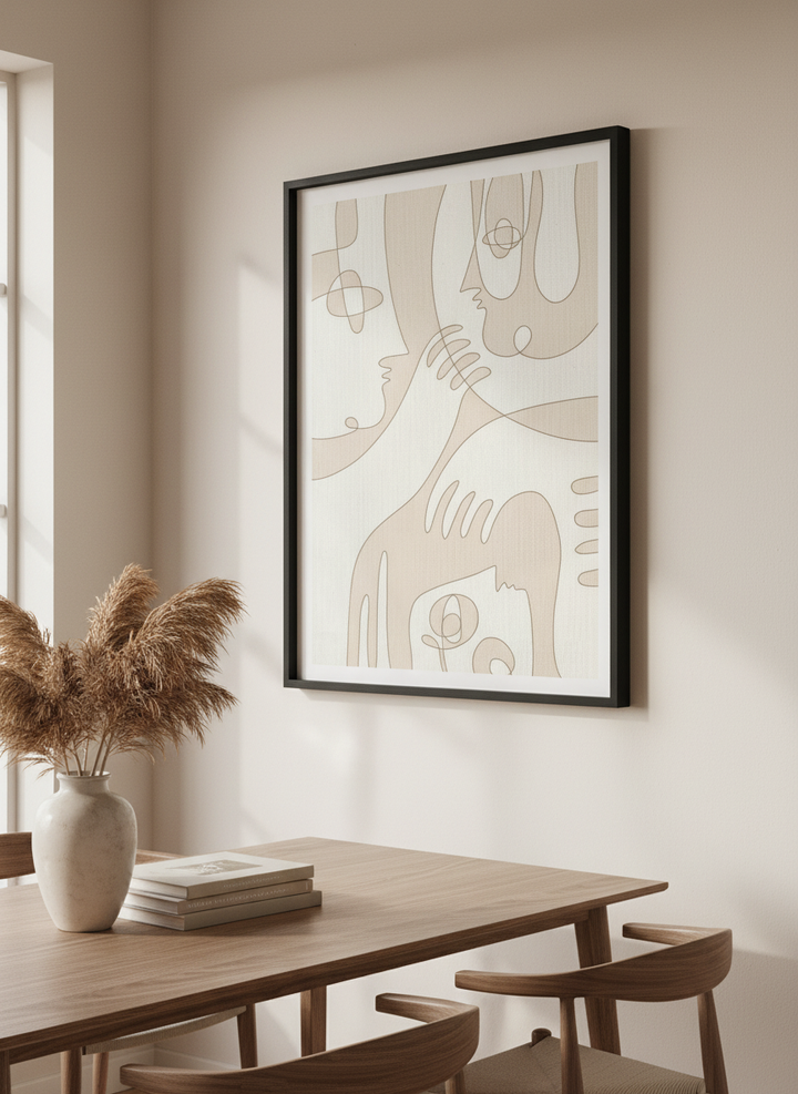 Wall art styled above a dining table in a contemporary home