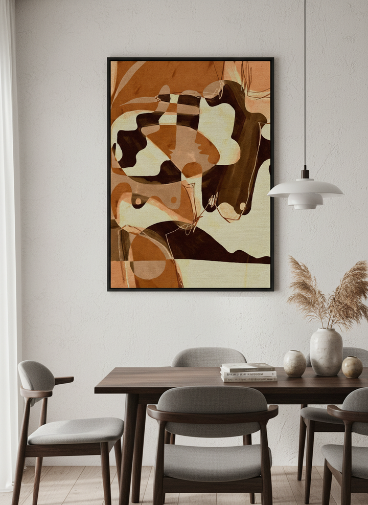 Wall art styled above a dining table in a contemporary home