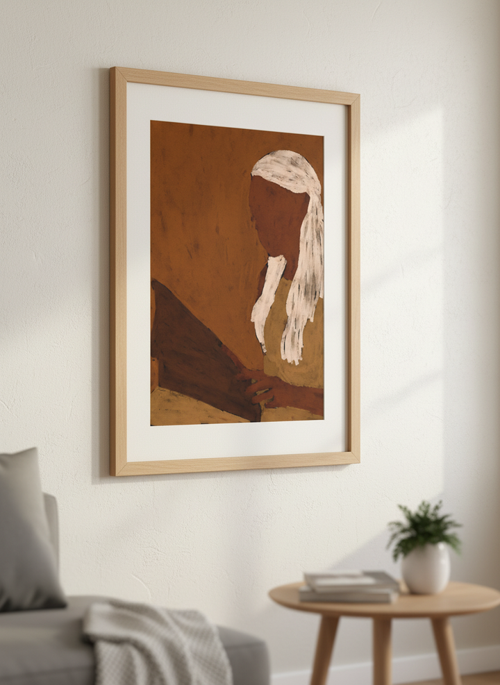 Modern wall art styled above a sofa in a neutral living room