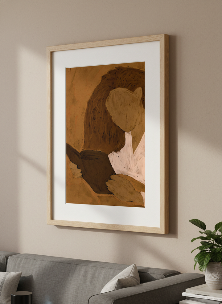 Modern wall art styled above a sofa in a neutral living room