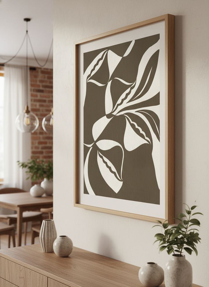 Wall art styled above a dining table in a contemporary home