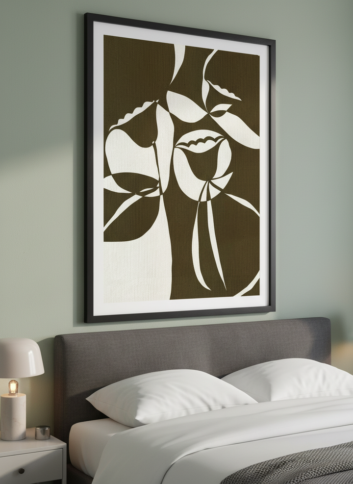 Minimalist artwork displayed in a calm, light-filled bedroom interior