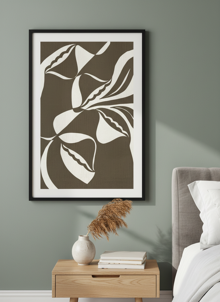 Minimalist artwork displayed in a calm, light-filled bedroom interior