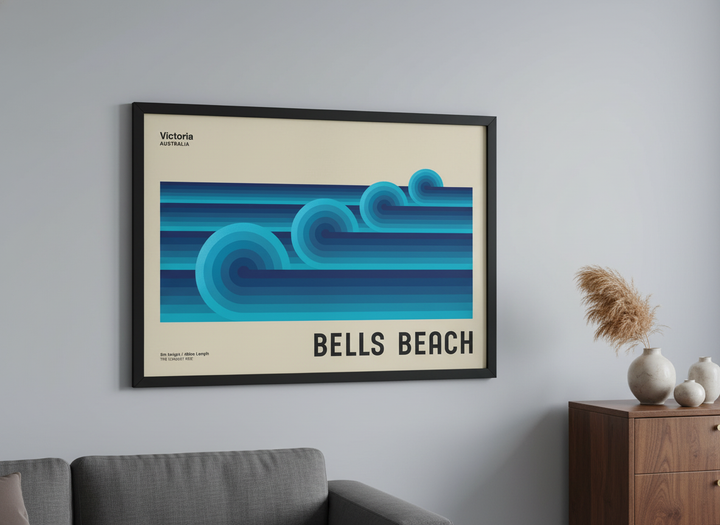 Modern wall art styled above a sofa in a neutral living room
