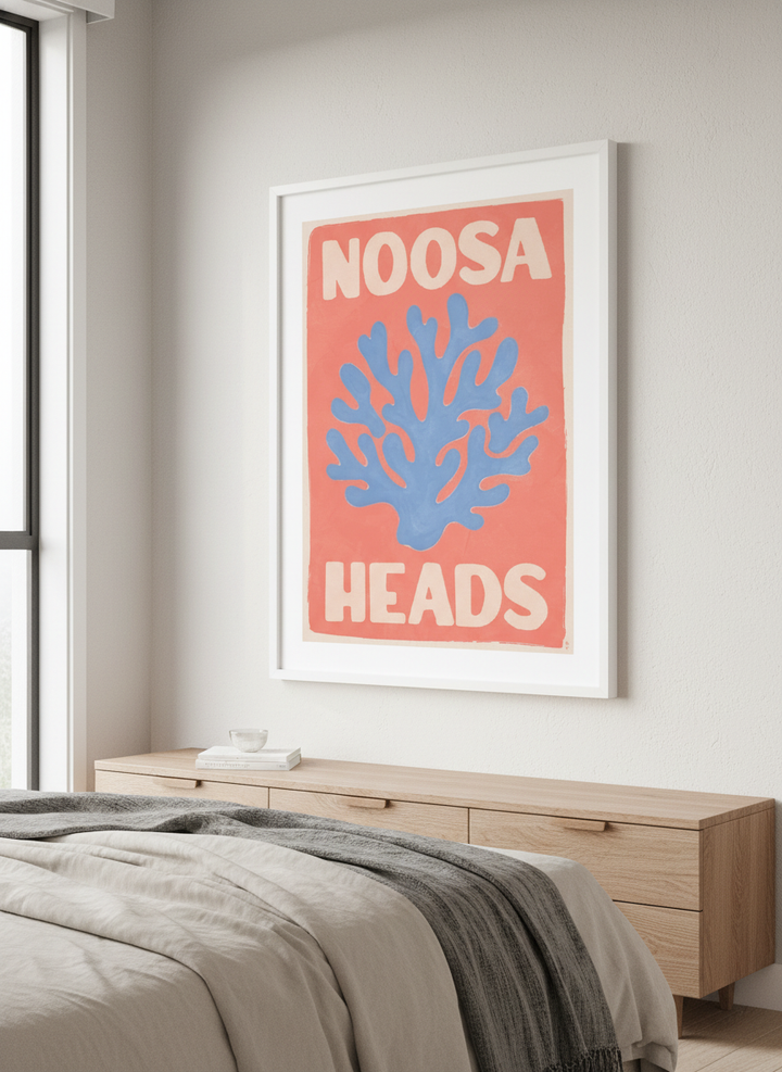 Minimalist artwork displayed in a calm, light-filled bedroom interior